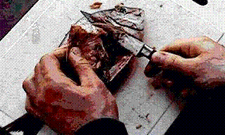 Someone cleaning a fish