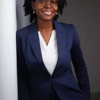 Headshot ofFaith Majekolagbe