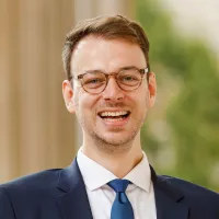 Headshot ofTim G. J. Rudner